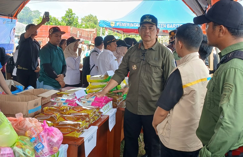 Bupati Shalahuddin Pimpin Restocking Ikan dan Gerakan Pangan Murah di Barito Utara