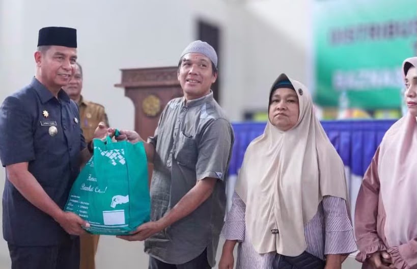 Pemkab dan BAZNAS Kampar Salurkan Rp147,3 Juta Zakat untuk 491 Warga