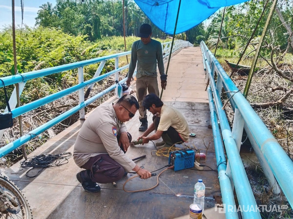 Warga dan Polisi Antusias Siapkan Renovasi Jembatan Merah Putih Presisi di Rimba Melintang, Sudah 65 Persen