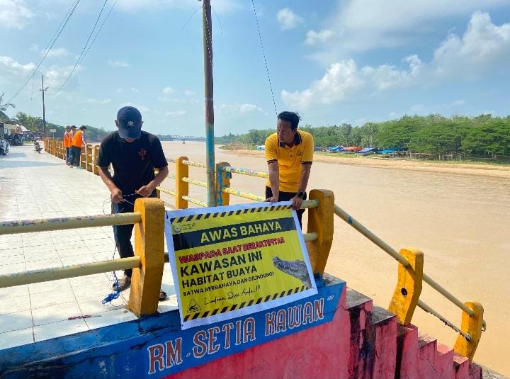 Jelang Pacu Jalur, Polisi Peringatkan Warga Waspada Buaya di Sungai Kuantan Hilir